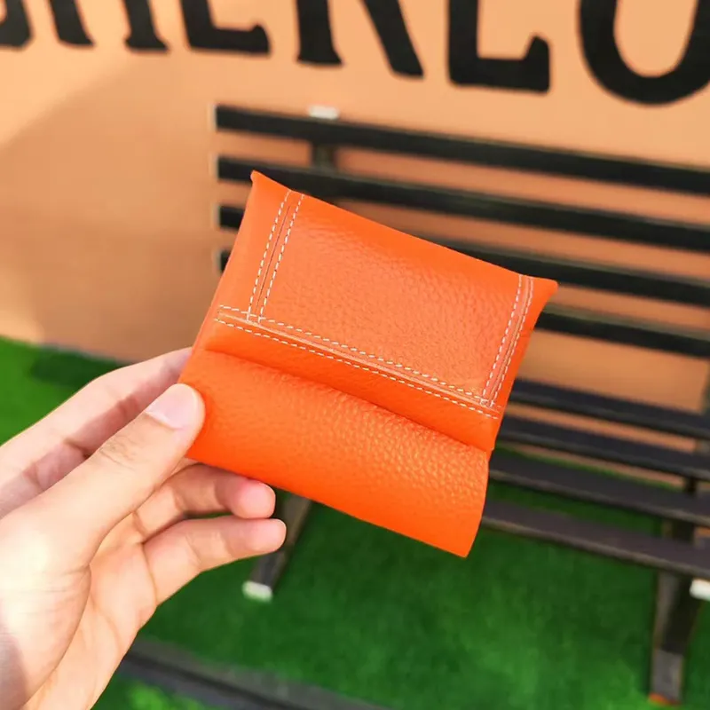Vrouw munt portemonnees echt leer kleine minimalistische koehide mini geldtas unisex luxe ontwerp portemonnee beroemde merkverandering zakje