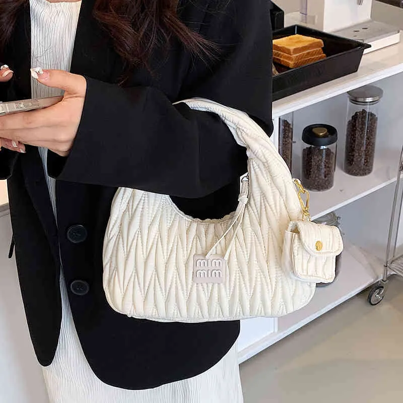 Messenger Bags Premium 2022 Fr￼hjahr neue Minderheit Frauenbeutel Geknitterte Hand -Unterarm Hei￟e M￤dchen Ein Schulter -Trendhandtaschen