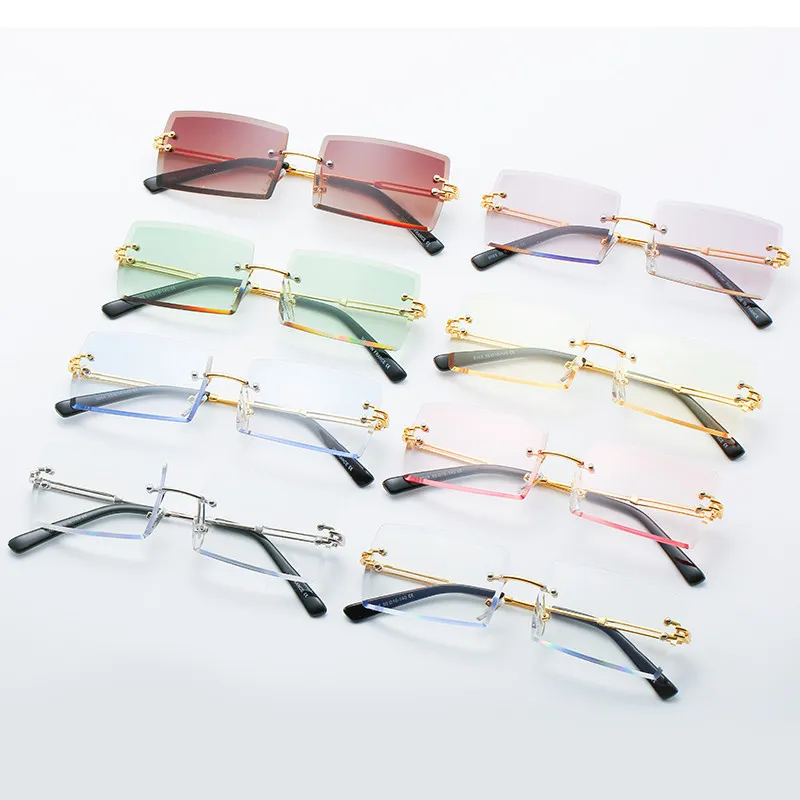 Solglas￶gon f￶r kvinnor Rimless Rectangle Trendy Fashion Sheer Pink Blue Lens Frameless Glasses Metal Art Vintage Buffs Glasses Men Shades Sport Style Retro Mirrored