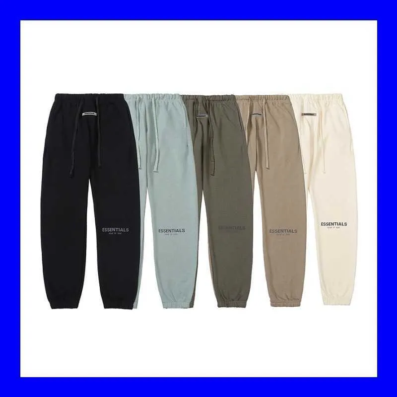 Pantalones para hombres y mujeres 2022 Fashion High Street Brand Ess Letter Reflective Sports Thin