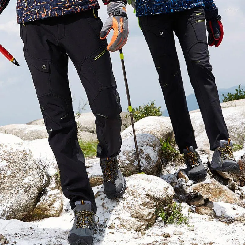 屋外パンツの女性ハイキングフリースズズズズズの厚いキャンプスキークライミングのための防水防風サーマル