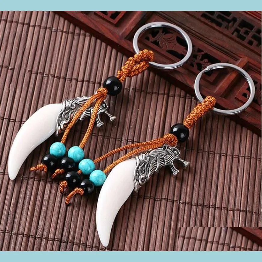 Keychains Creative Women and Men Imitatie Wolf Tand hanger Keychains Retro Tassel Keyrings Charme auto Key Accessoires Drop Lulubaby DH2ed