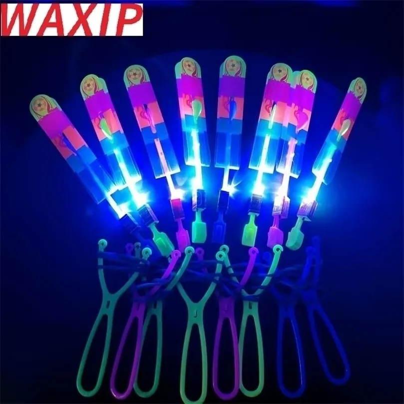 LED SwordsGuns 100Pcslot or 50pcs Amazing Light Toy Rocket Helicopter Flying s Party Fun Gift Rubber Band Catapult 220905