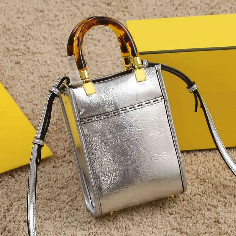 Tygväska kvinnor guld silver handväskor lyxiga läder axelpåsar designer väska handväska kväll crossbody lady book totes 220902