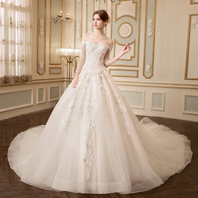 Off-Shoulder A-Line wedding dress with gloves with Bling Sequins, Beading, Lace Appliques, and Long Sleeves - Elegant Bridal Gown (Vestidos de Novia) Off-Shoulder A-Line wedding dress with gloves with Bling Sequins, Beading, Lace Appliques, and Long Sleeves - Elegant Bridal Gown (Vestidos de Novia)