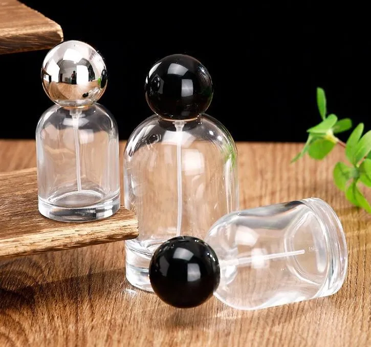 Bottiglia riutilizzabile di profumo a crimpare in vetro trasparente da 30 ml 50 ml 100 ml Bottiglia spray vuota imballaggio cosmetico con coperchio a forma di palla in argento nero
