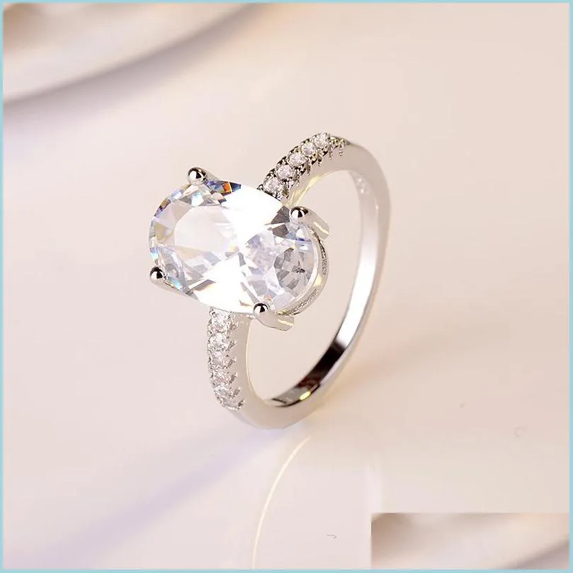 With Side Stones Trendy Ring Crystal Engagement Claws Design Rings For Women White Zircon Cubic Elegant Female Wedding Jewer Yydhhome Dh8En
