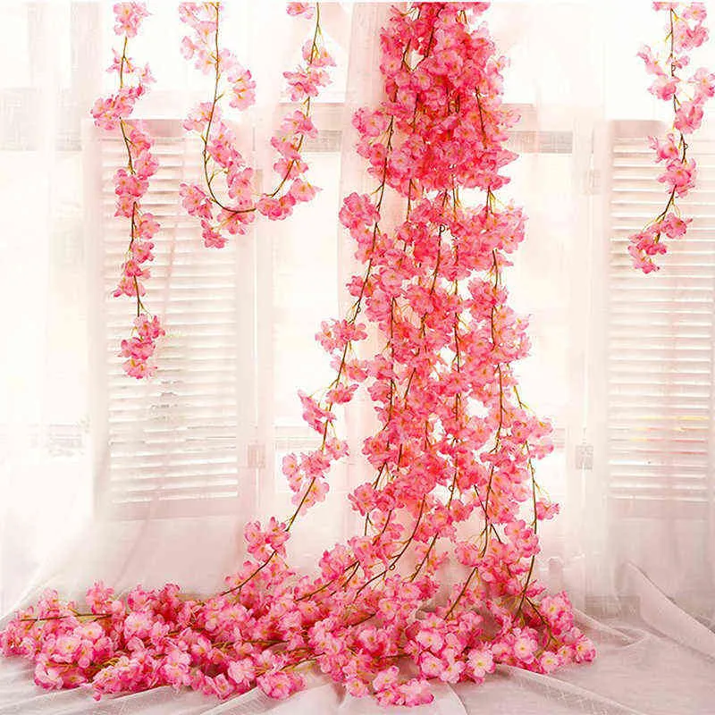 Faux Floral Greenery 1Pcs Fiore artificiale Sakura Vines 180Cm Natale Matrimonio Home Decor Fotografia Porps Piante artificiali per Garden Party J220906