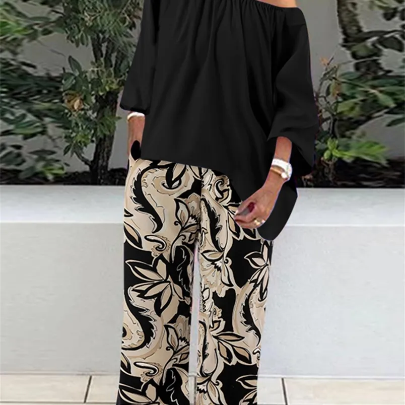 Kvinnors tvåbitar byxor Celmia Casual Loose Street Suits Women 2st Pant Set One Shoulder 3/4 Sleeve Tops och blommor Print Wide Ben Trousers Set 220912