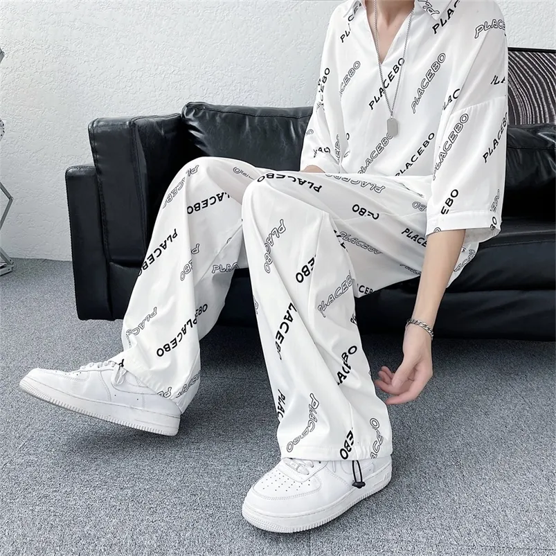 Tute da uomo estive leggere 2 pezzi set per uomo moda coreana abbigliamento gotico adolescenti hip hop streetwear maglietta in raso pantaloni gamba dritta 220914