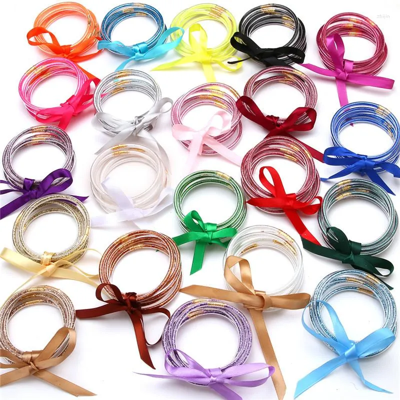 Bangle 5PCS IN ONE Fashion Jewelry Friendship Bowknot Glitter Powder Filled Jelly Tube Plastic Bracelet Set