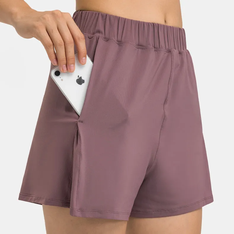 Des tenues de yoga courent short pour femmes ajustement élastique Pantalon de yoga en vrac