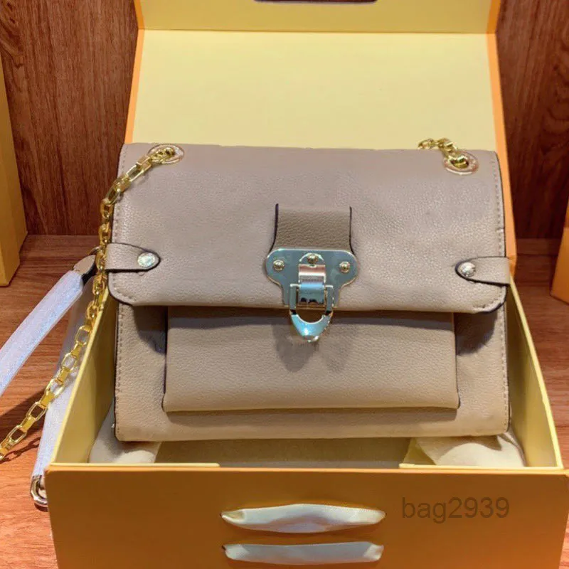 Bolsas de bolsas de noite bolsas para mulheres bolsas de crossbody Bolsa de relevo Golden Chain Top Quality Shoiulder Bag simples e versátil Smal prático