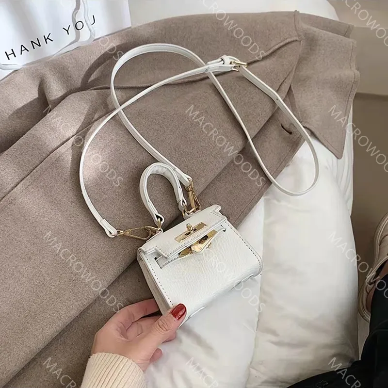 Mini sac fourre-tout Sac de messager de créateur Sacs à main pour filles Sac à main pour enfants Sacs à bandoulière pour femmes de mode Luxe dame cross body Étuis pour écouteurs cosmétiques Portefeuille uni HBP