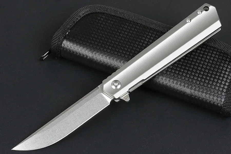 M6674 Titanlegering Flipper Folding Knife D2 Stone Wash Drop Point Blade CNC Finish Handle Boll Bearing EDC Pocket Folder Knives With Nylon Bag