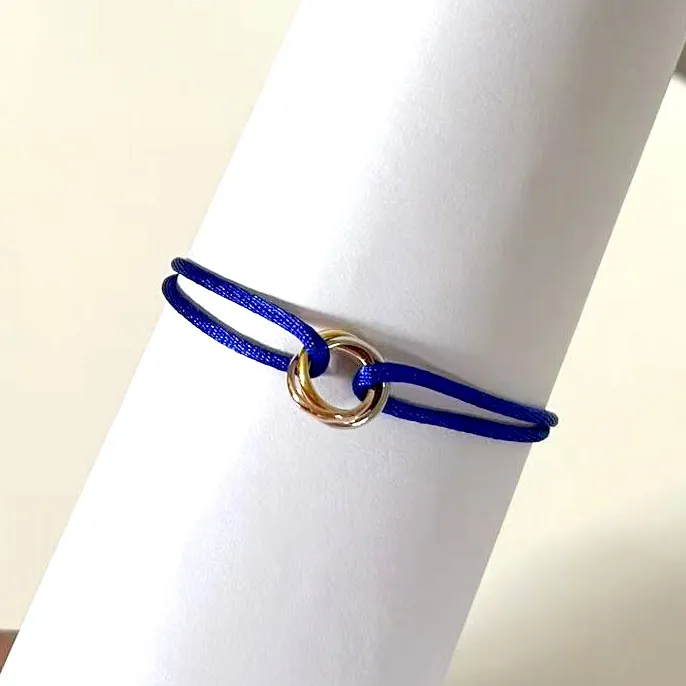 Mode 316L rostfritt stål Trinity Ring String -armband Tre ringar Handband Pararmband för kvinnor och män Fashion Jewwelry Famous B 696