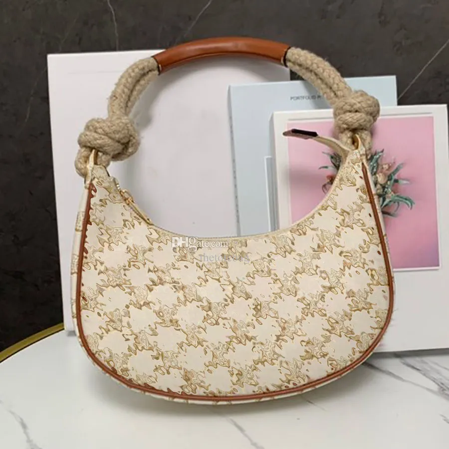ava bag in triomphe canvas and calfskin white