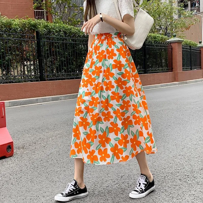 Jupes La jupe parapluie en forme de fleur orange pour l'été 2022 est une couleur contrastée mince élastique mi-longue