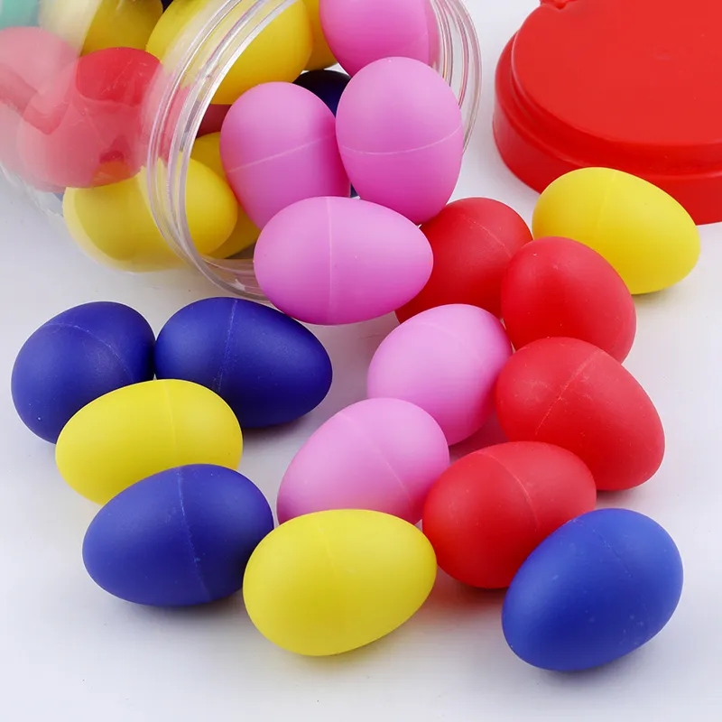 Instrumentos musicales de huevos de plástico Bloqueos Bloqueos de rompecabezas Educación temprana Cultive Hobby de música infantil