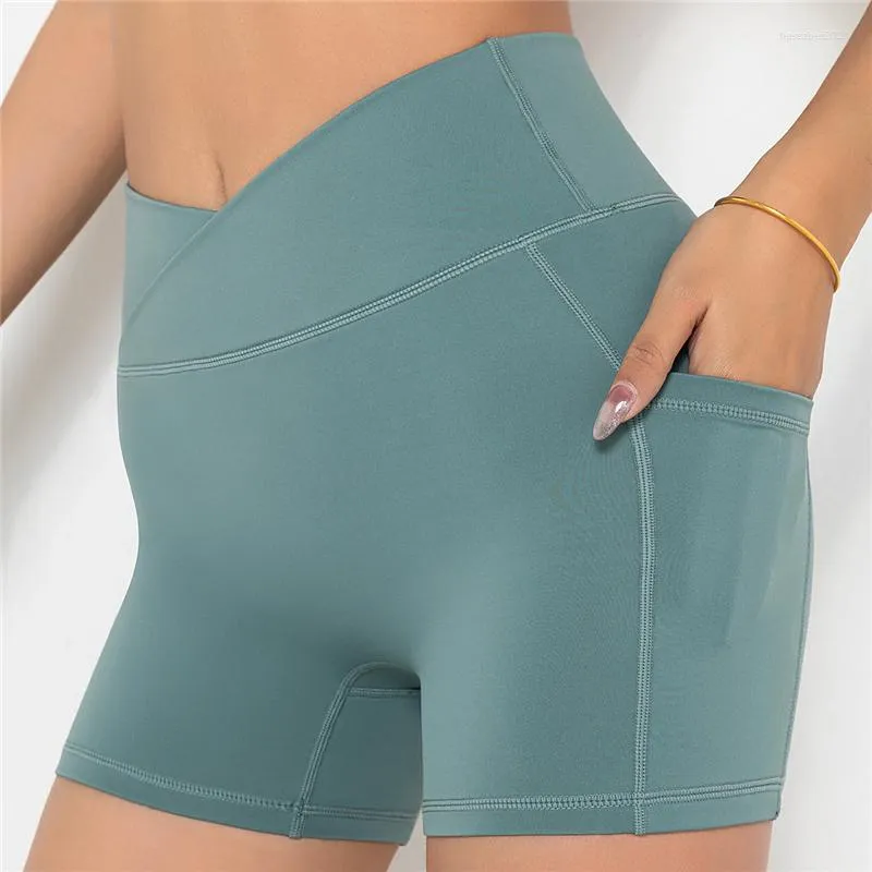 Активные шорты Женщины спортивны йога голые чувства спортзала короткие брюки сексуальное крест -талию бедро отжимание