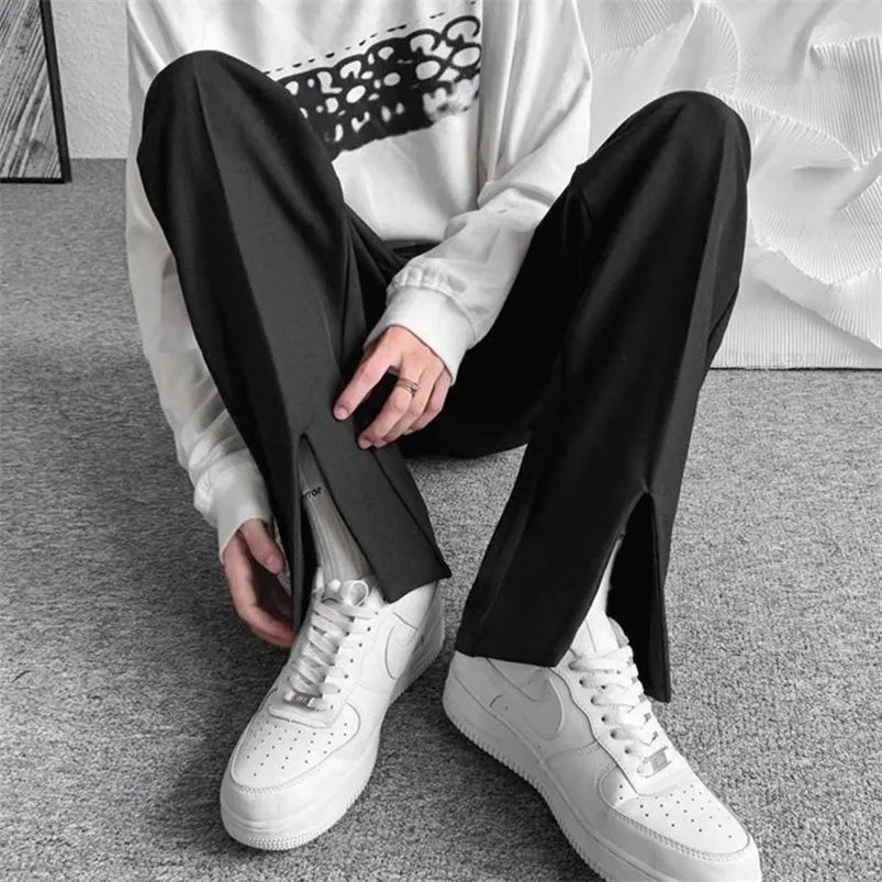 Herrbyxor streetwear mode män byxor överdimensionerade casual byxor delade svart koreanska 220922