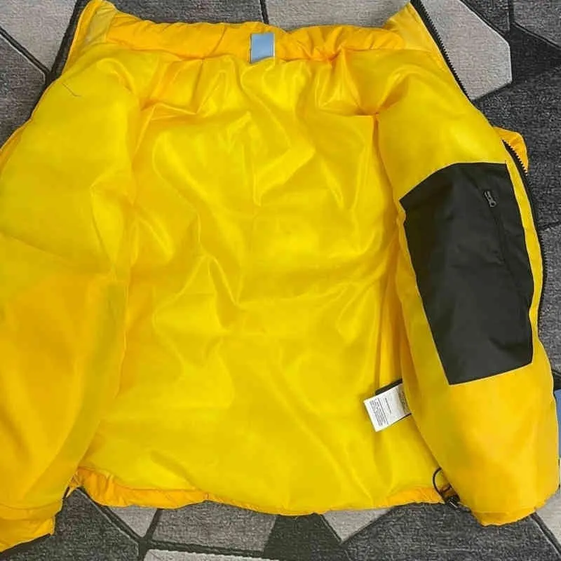 Manteau en duvet de styliste jaune d'hiver pour hommes et femmes, veste à pain épaisse, à la mode, coupe chaude comme un gant, à la mode