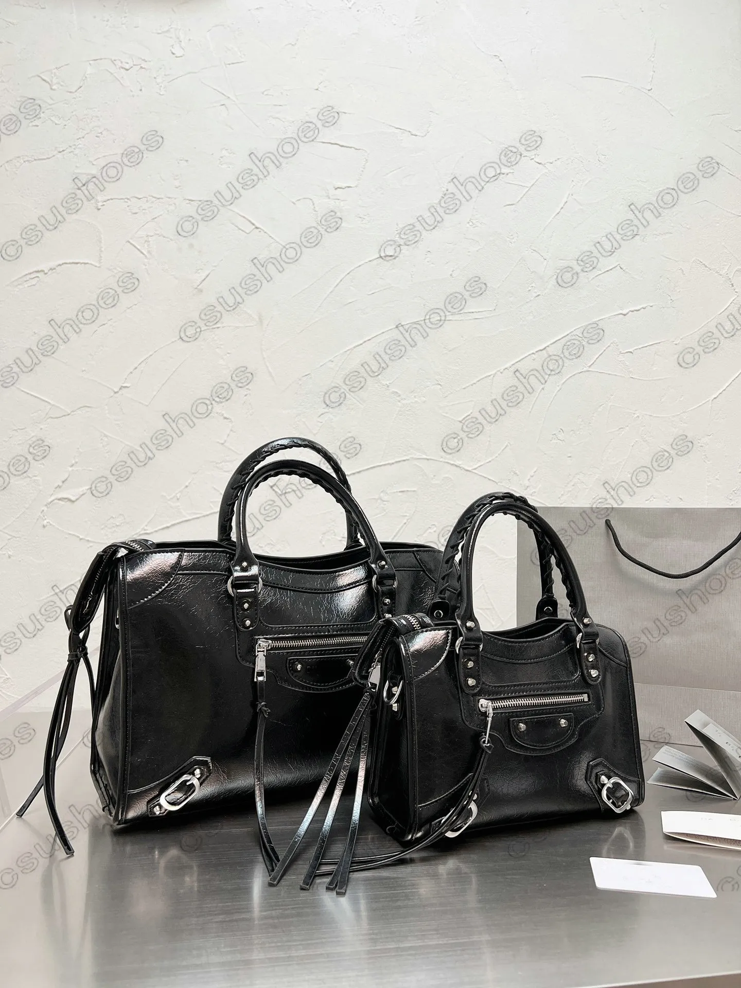 Mini borsa da moto Donna Luxurys Borsa a tracolla intrecciata Borsa a mano in pelle MM Mens Designer Totes Fibbia in metallo di grande capacità Rock con logo 25 39 cm