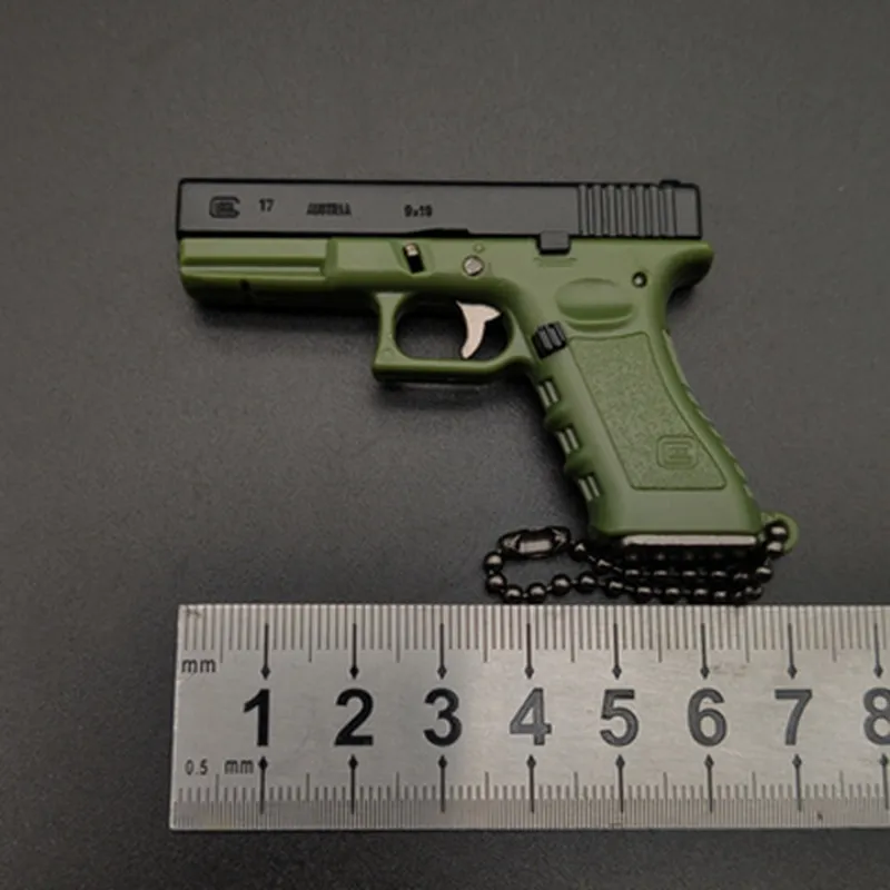 新しい 1-3 G17 ピストル銃取り外し可能なミニチュアモデル合金キーホルダーギフトバックパックペンダント装飾ギフトおもちゃトレンド少年お気に入り 1084