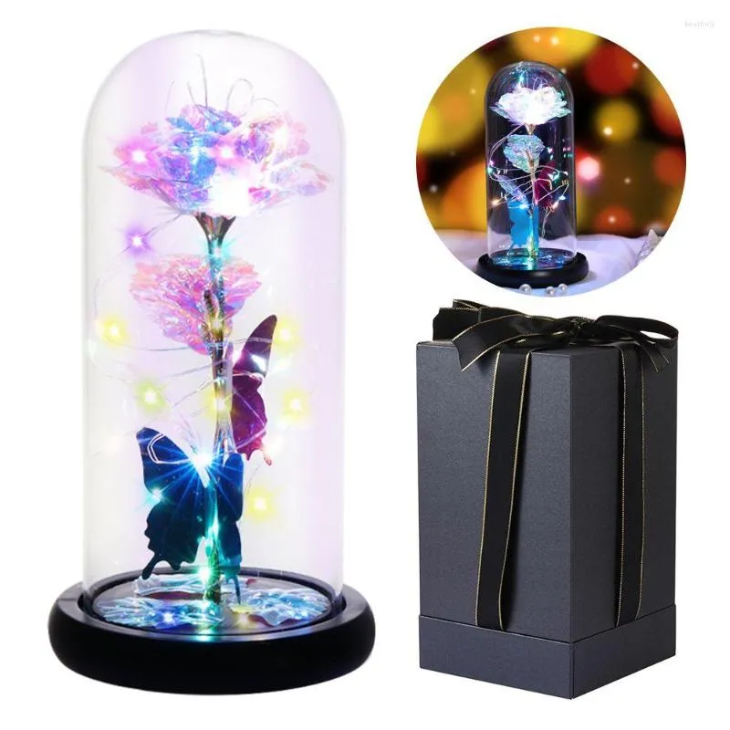 Fleurs d￩coratives pour toujours rose dans le d￴me en verre avec des lumi￨res LED