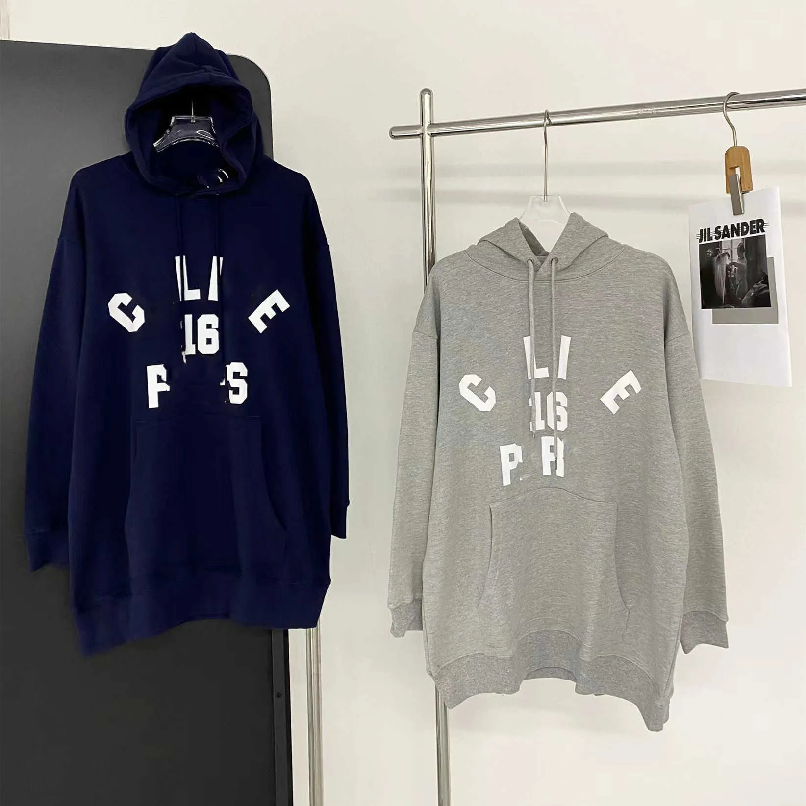 Sweats à capuche pour femmes Sweatshirts Automne et hiver couleur impression moyen long pull à capuche pour femmes âge réduisant le haut de style collège