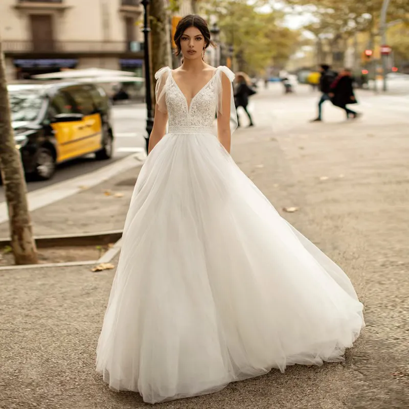 Sexy dentelle plage robe de mariée 2022 bretelles Spaghetti une ligne Boho pays robe de mariée bas dos nu Tulle balayage train pays femmes Robe De Mariee élégant Vestios Novias