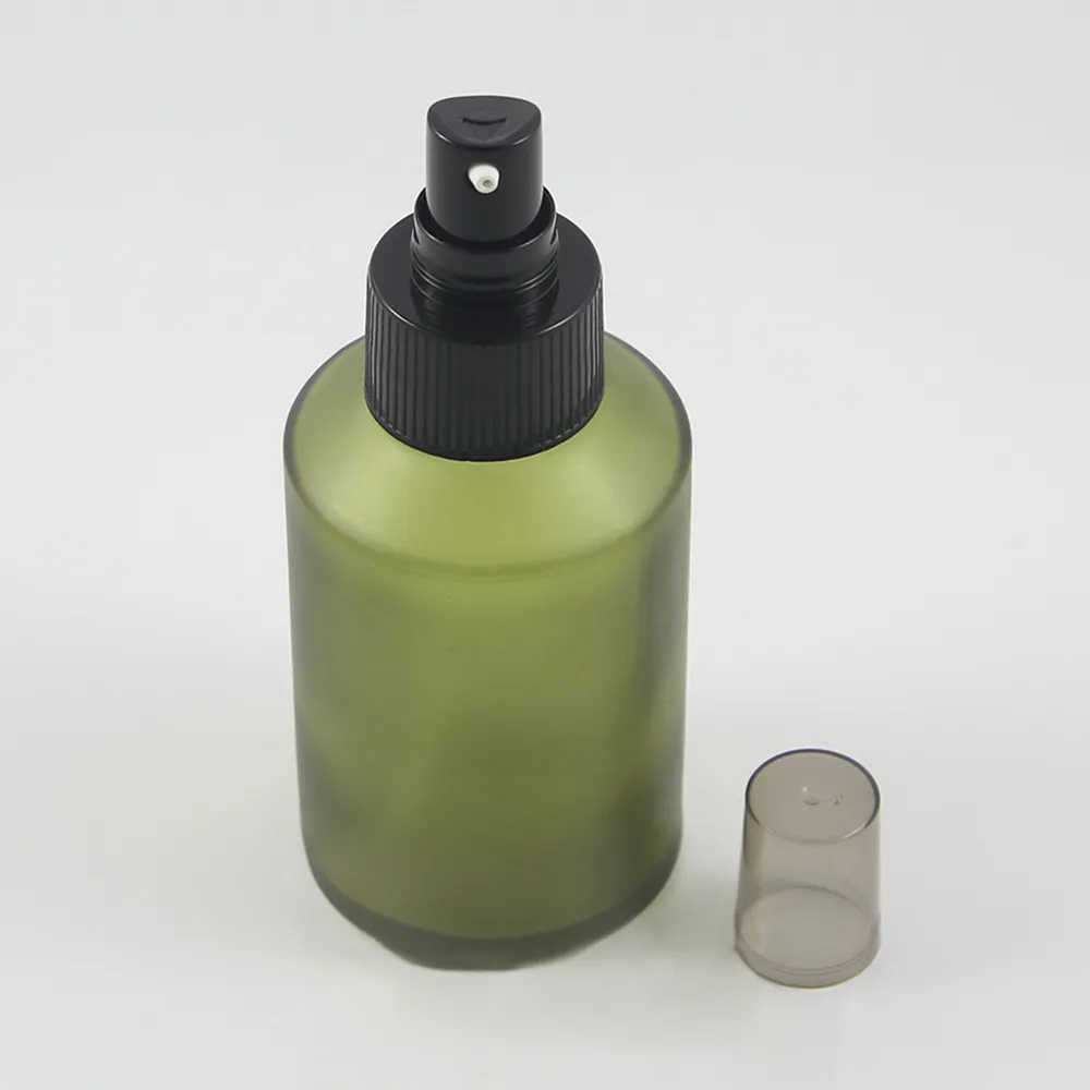 Pusty 125 ml okrągła jasnozielona zamrożona butelka z czarną pompą 125 ml szklane opakowanie kosmetyczne do płynnego kremu i balsamu