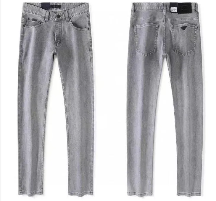 Jeans pour hommes classique Pantalon en denim hip-hop de marque de mode pour hommes d'été fermeture à glissière de haute qualité tissu de lavage élevé pantalon de broderie d'emblème de lettre élastique doux A001