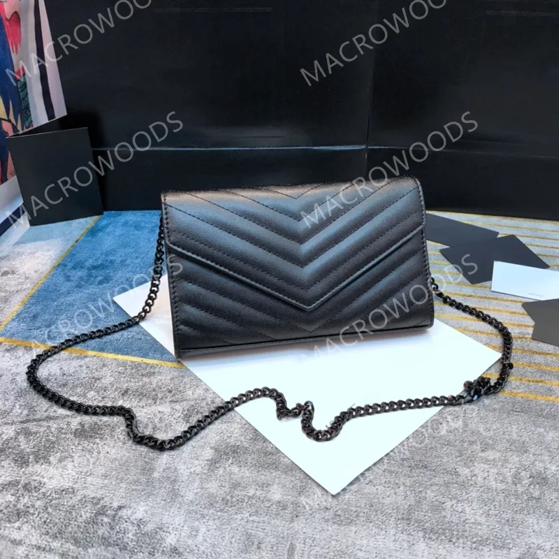 monogram chain wallet in grain de poudre embossed leather