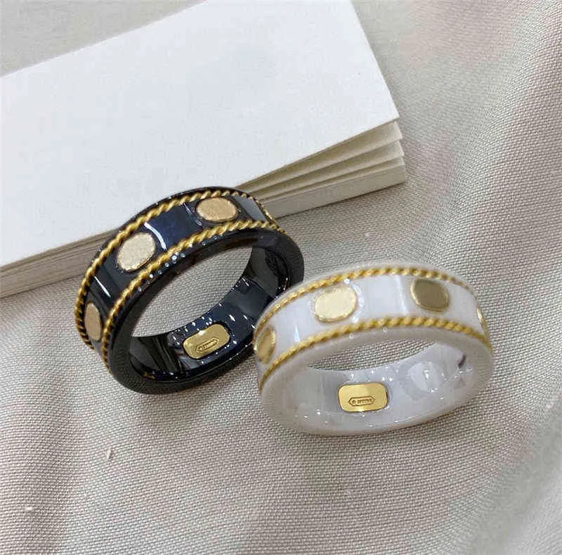 bai cheng designer de luxo moda masculino anéis de mulheres amor anel preto branca ceram anéis de casais letras imprimem jóias de designer de alta qualidade