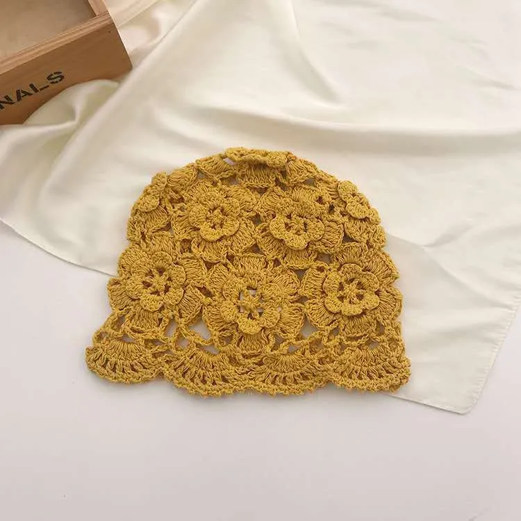 Fleur tissée à la main chapeau mince creux printemps et été dentelle respirant tête foulard chapeau crochet Baotou fil de coton chapeau