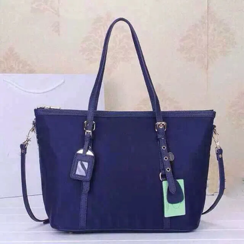 Bolsos de compras de lona a prueba de agua Bolso de mano de gran capacidad de cuero genuino Bolsos casuales para mujeres Bolso de mensajero de lujo Bolso de hombro de tela de paracaídas para dama