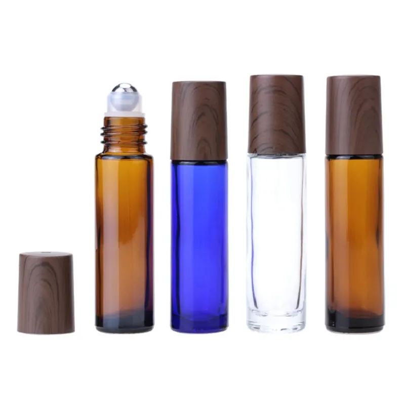 Flacon de massage en verre bleu marron clair, rouleau en acier, couvercle en faux bois noir, emballage cosmétique, récipient rechargeable, flacons vides d'huile essentielle de crème pour les yeux de 10 ml