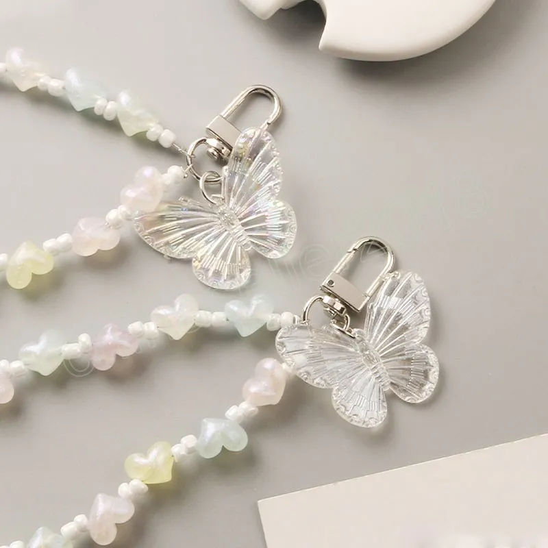 Mode papillon porte-clés à la mode Transparent perle lanières porte-clés chaînes de téléphone portable pour les femmes clés de voiture sac décor pendentif
