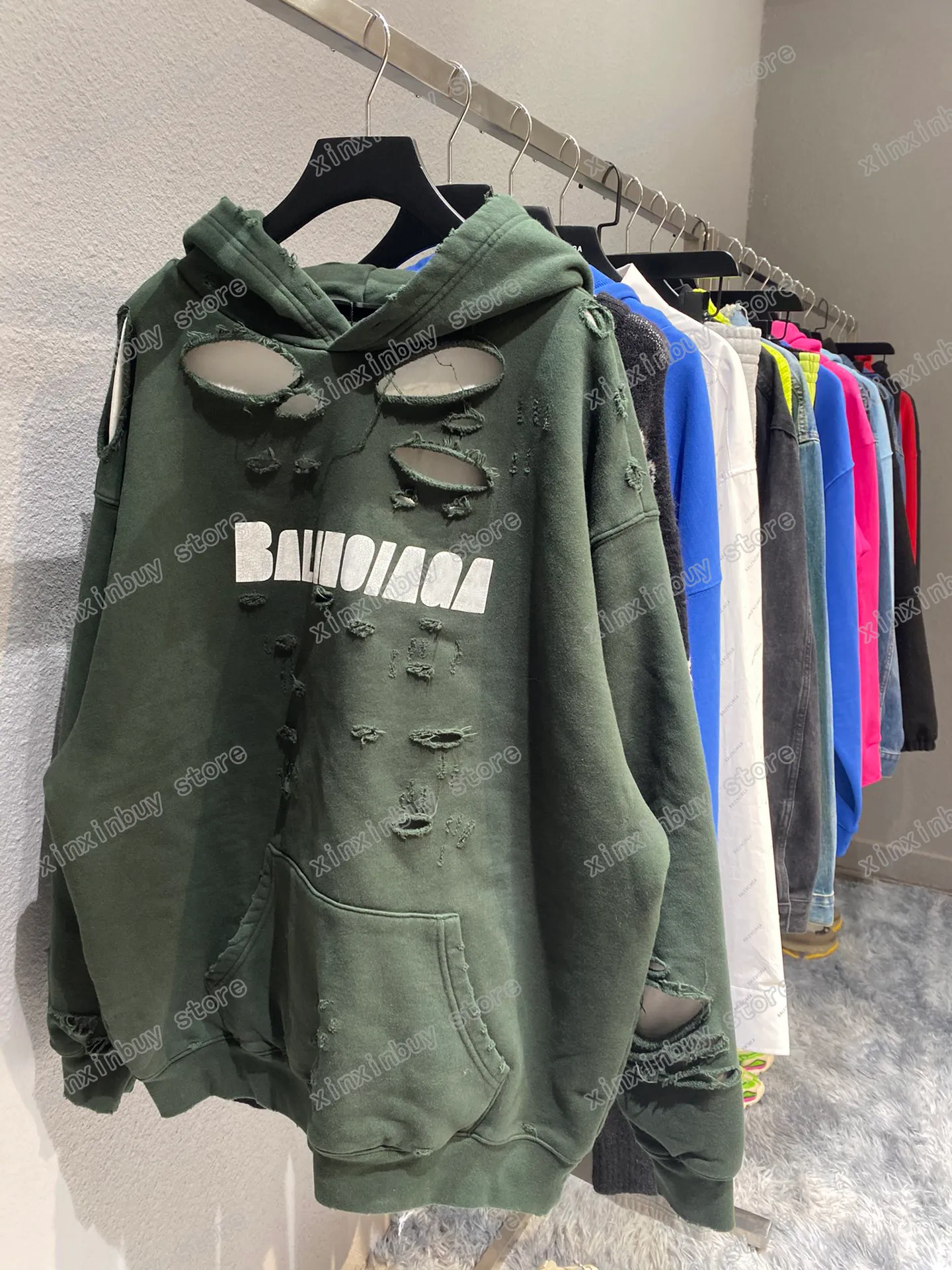 Hoodies من Xinxinbuy Men Designer Destrofied Letter Paris Hole Cotton Pullover Women Green Green Black XS-L