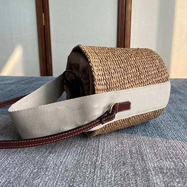 Högkvalitativa mini Stripe Bucket-väskor canvashalm Korg Tygväskor nya sommarsemester strandvävda flätade axelväskor svarta modehandväskor för kvinnor