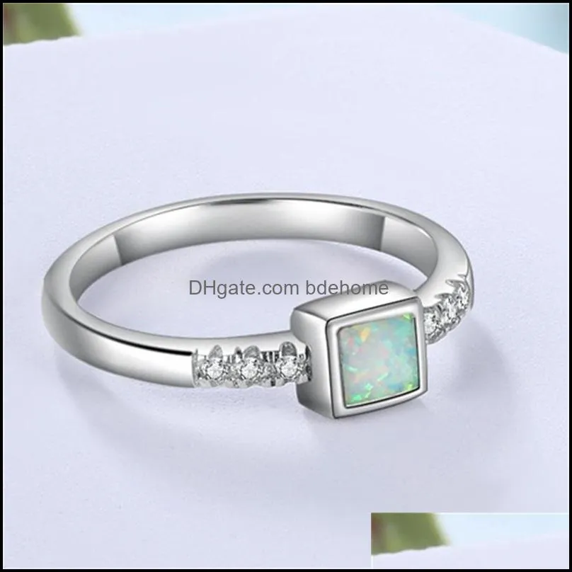 Pierścienie klastrowe pierścienie klastrowe Prawdziwe 925 Sterling Sier White Fire Opal Clear Zirconia Crystal zaręczynowe obrączki Women S925 Biżuteria Dhi6Y