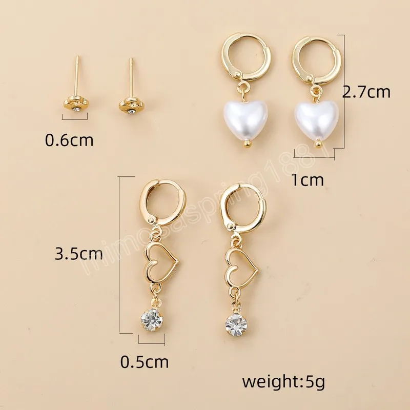 Set di orecchini pendenti a forma di cuore di perle alla moda donna Orecchini a bottone in cristallo CZ con stella di luna color oro in metallo Gioielli con fibbia dell'orecchio