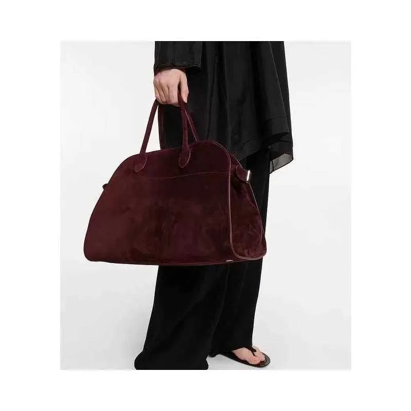 Trendy suede hotsell duffle bag