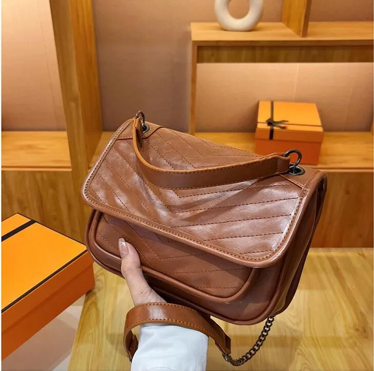 femmes sacs à main de luxe sac à main sacs à bandoulière changer femmes portefeuille classique fourre-tout Bag304G