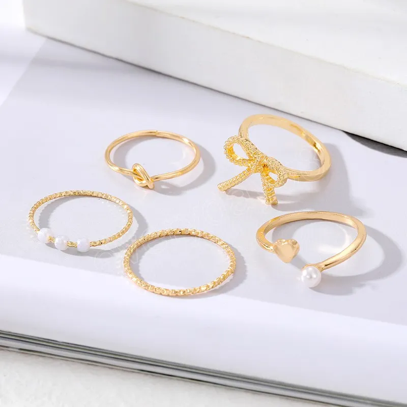 Perlenringe Set Vintage Gold Farbe Schleifenknoten Ringe Herz Twist Ring Zubehör Mode trendiger Schmuck