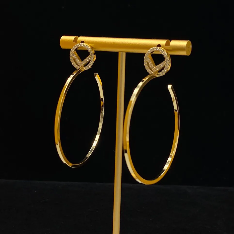 Jóias de designer de moda de brinco de argola de aro de ouro para mulheres Earings de luxo de luxo.
