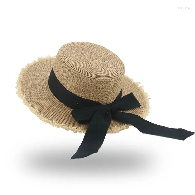 Chapeaux à large bord Chapeau de paille Femmes Protection solaire Plage Noir et blanc Ruban Bowknot Cap Casual Dames Plat Top Panama