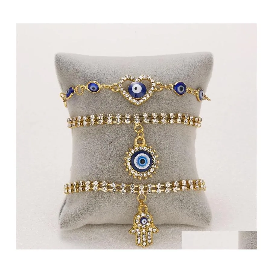 Bracelets de charme Classique Turc Evil Eye Bracelet Pour Femmes De Luxe Aaa Cubique Zircon CZ Hamsa Main Charme Tendance Femelle Bijoux De Fête G Dhzuq