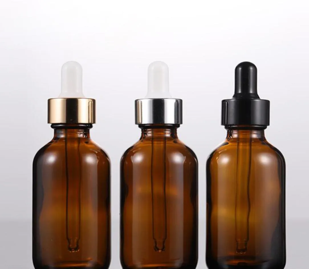 Hela Amber Essential Oil Droper Bottle 2 Oz Boston Rund glasflaska med svart guld silverlock för kosmetisk förpackning5076519